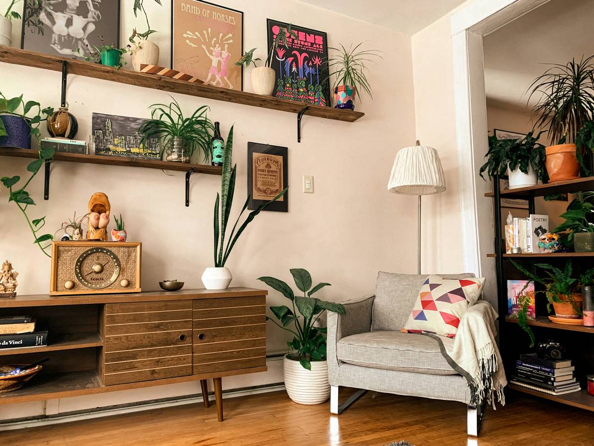 Smart home amenity mid century modern living room with hidden speakers and vintage-inspired smart thermostat